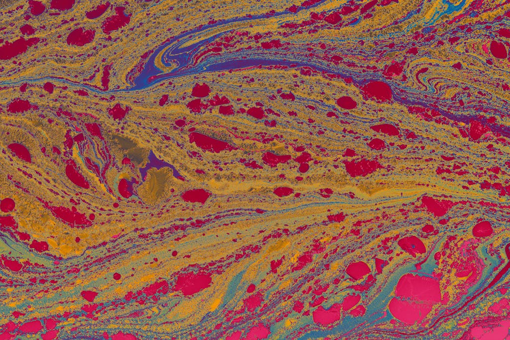 Most Expensive Player Colorful abstract fluid art with earth tones and vibrant patterns.