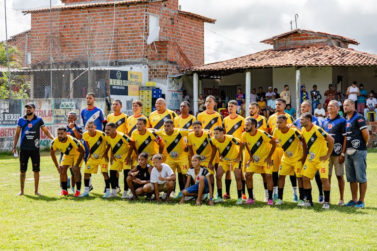 Dream11 Team Today Local amateur football team poses for a group photo before starting their match.