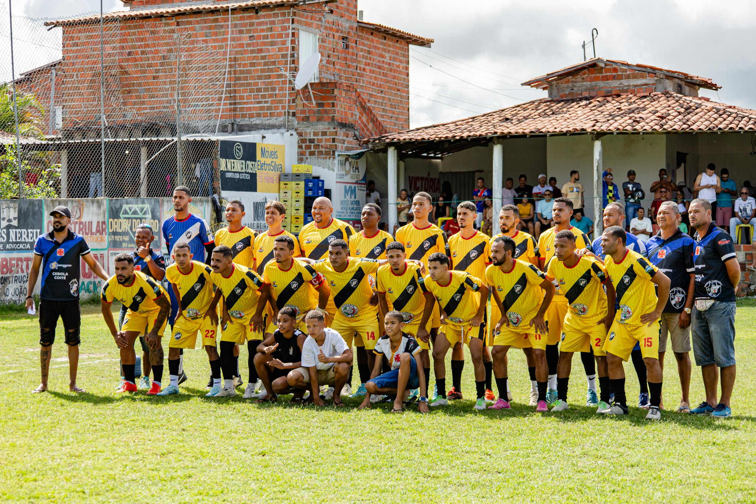 Dream11 Team Today Local amateur football team poses for a group photo before starting their match.